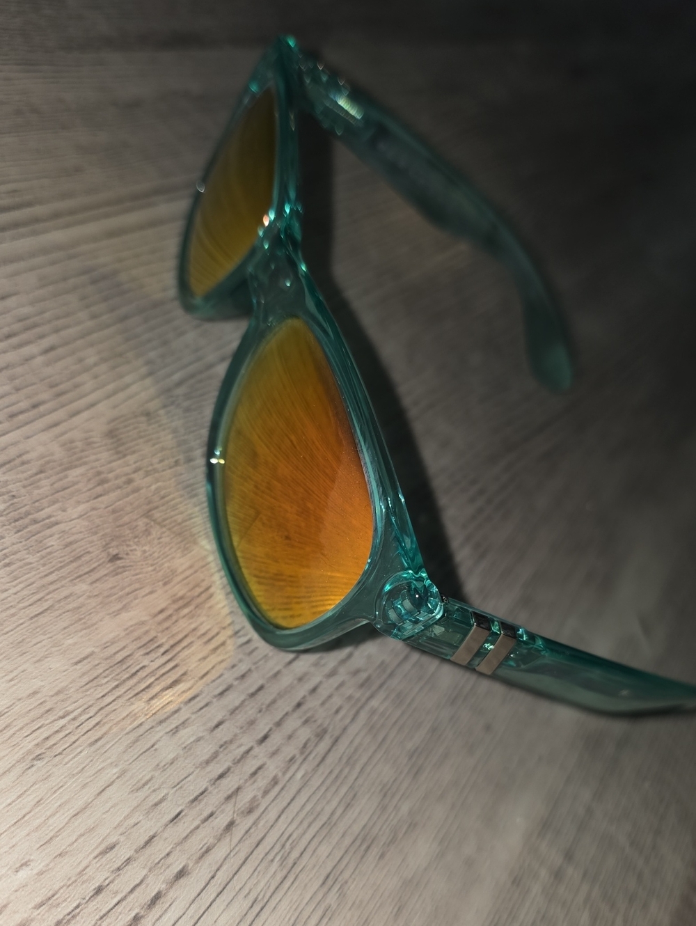 Women’s Teal Frame Sunglasses with Orange Mirror Lenses